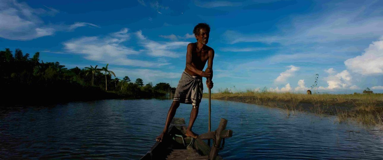 local man boating at majuli island